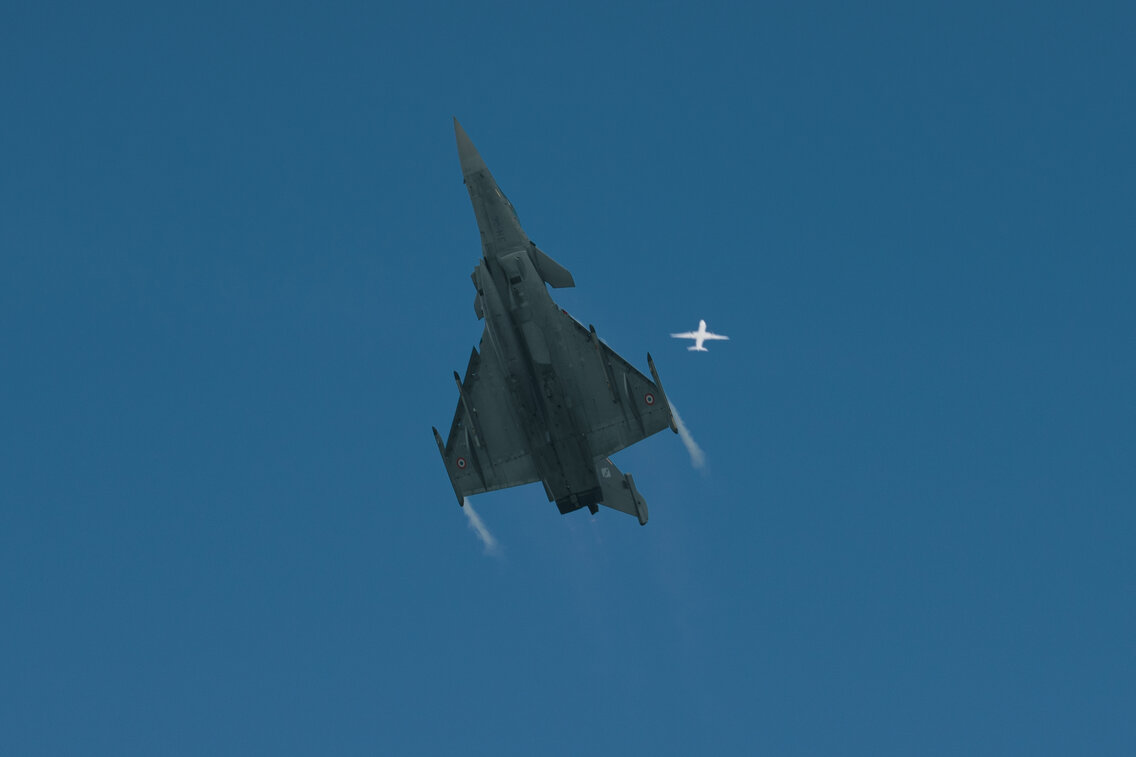 Contrail at sunset